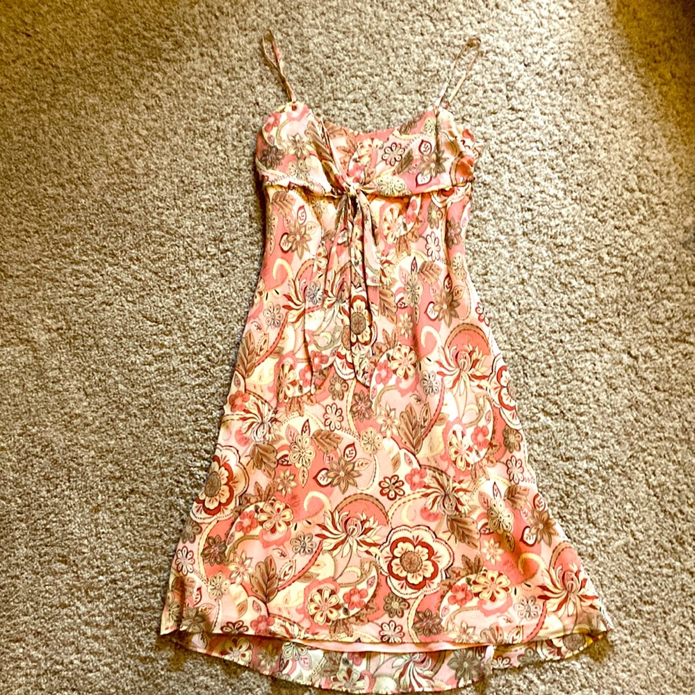 Silk floral dress in shades of peach and tan